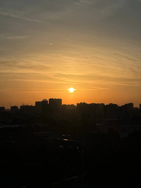 Закат в городе Б. -  